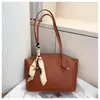 Bolsa Tote de Gran Capacidad 2026 Nuevo Estilo Bolso de Hombro Versión Coreana Color Sólido Bolso de Mujer Nicho Versátil para Viajar Bolso de Axila Bolso de Mujer