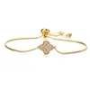 Pulsera de Lujo Ligero de Alta Gama para Mujer Aogu, Cobre Chapado en Oro de 18 Quilates con Incrustaciones de Circonita, Diseño de Flor Hueca, Suministro de Comercio Exterior