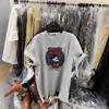 Camiseta de Manga Curta Estampada Cartoon Retro Coreana de Verão para Mulheres Nova Solta Estilo Preguiçoso Versátil Gola Redonda Top
