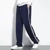 Calça de uniforme escolar estilo Hong Kong para meninos e meninas, nova para primavera e outono, azul marinho, esportes do ensino médio, duas listras, perna reta, calça escolar, calça casual