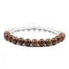 Pulseira Artesanal de Madeira Natural e Pedra Vulcânica com Design Único Apresentando Tons Terrosos e Padrões Marcantes Perfeita para o Dia a Dia ou como um Presente Estiloso para Homens e Mulheres Ideal para Looks Casuais e Boho