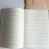 Cuaderno de Tareas Longyi Cosido con Hilo Papel Doble Recubierto 70g Engrosado para Estudiantes de Primaria con Caracteres de Tamaño Mediano para Práctica de Matemáticas y Pinyin