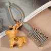 Colgante de Caballo del Zodiaco Tallado en Sándalo Dorado, Diseño de "Caballo Llorando", Llavero de Barra de Dinero "Hazte Rico al Instante", Colgante para Bolso, Borla