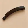 Pinza de plátano en forma de corazón Melard marrón, un accesorio para el cabello sofisticado y minimalista con un lazo y diseño floral