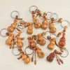 Llavero del zodiaco de madera de durazno para la paz y la prosperidad, colgante de llave de coche de calabaza, popular en atracciones turísticas y puestos culturales y creativos