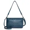 Venta al por mayor transfronteriza de bolsos auténticos para madres de mediana edad, bolsos cruzados para mujer, nuevos bolsos de hombro de moda trendy Primavera 2026