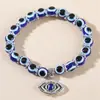 Amazon Explosiones Pulsera Ojo de Diablo Mariposa Elefante Mano de Fátima Colgante Resina Cuenta Redonda Pulsera Ojo Azul