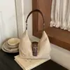 Bolsa de ombro transfronteiriça de alta qualidade para mulheres, novo estilo casual e moderno, perfeita para looks da moda, adequada para o trajeto diário e versátil para o uso cotidiano.