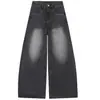 Jeans de pierna ancha en mezclilla lavada color naranja joven para mujer, con diseño de salpicaduras de tinta desgastadas, corte holgado, efecto adelgazante y estilo versátil y elegante de pierna curva