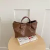 Bolso Cubo Tejido de Nicho Transfronterizo Nuevo Estilo 2026 Moda Canasta de Verduras Bolso de Mujer Simple de Hombro Cruzado Bolso de Mano