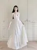 Vestido de Alta Costura Off-White para Mulheres, Novo Estilo Verão 2026, Vestido de Alcinha Estilo Resort Emagrecedor, Vestido Longo para Mulheres
