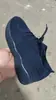 Nuevos zapatos casuales de talla grande para exportación transfronteriza de verano, suela gruesa, color sólido, con cordones, tejido flyknit, slip-on, zapatos planos