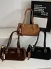 Bolso Retro de Gama Alta Coreano para Mujer 2025 Nueva Moda Bolso Versátil de Axila para el Trabajo y los Viajes Bolso Hombro Baguette