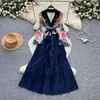 Vestido plisado de estilo commuter para mujer, con cuello de traje, abalorios, diseño de dos piezas falsas, con cinturón de corbata, vestido largo, Otoño 2026