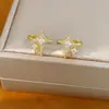 Clip de oreja de estrella de circón bañado en oro real de 14K para mujeres sin perforaciones, clip de cartílago de oreja exquisito y versátil, pendientes de lujo ligero y de alta gama