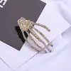 Pinza para el Cabello de Calavera con Garra Fantasma y Pedrería Moda Pinza de Garra para el Cabello Pinza para Flequillo Pinza de Hueso de Mano Accesorios al por Mayor