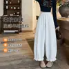 Pantalones grises cropped de estilo linterna para mujer petite, nuevo estilo primavera y otoño, con un look relajado y chic, caracterizados por un diseño de pierna ancha y una estética inspirada en Corea.