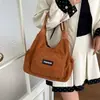 Bolsa tote retrô de grande capacidade para compras transfronteiriças, nova bolsa de mão de veludo para outono e inverno de 2026, bolsa tote simples para o dia a dia