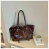Bolsa de Gran Capacidad Transfronteriza para Mujer 2026 Nuevo Estilo Moda Tendencia Versión Coreana Bolsa de Mano Simple Versátil de un Solo Hombro para Viajar