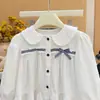 Camisa de outono nova estilo coreano para meninas, 100% algodão, com laço estilo coreano, camisa casual para bebês, estilosa para a primavera