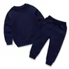 Conjunto de Dos Piezas de Sudadera y Pantalón de Chándal para Niños de Primavera y Otoño, Nuevo Estilo para Niños Grandes, Medianos y Pequeños, Conjunto de Uniforme Grupal, Diseño Liso en Stock, Modelo de Exportación