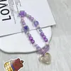 Cadena de cuentas de colores dopamina de moda para teléfono con colgantes de corazón y flor de acrílico para bolsos y cámaras de niñas