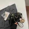 Bolso de cadena transfronterizo de nicho con patrón de diamante para mujer, nuevo bolso de mano versátil versión coreana para la primavera de 2026, bolso de hombro y cruzado