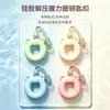 Chaveiro fortalecedor de pegada de silicone do fabricante com logotipo personalizado, pingente de anel de pegada portátil para alívio do estresse, mercadoria de suporte para ventilador