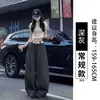 Colección Otoño 2026 para mujer Melard: Pantalones de pana color café, de corte holgado, fluidos, estilo pierna ancha, adecuados para figuras petite