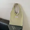 Bolso de Ocio de Nicho para Mujer 2025 Nuevo Bolso de Hombro Rayado de Pana Estudiante Viajero Plegado Bolso Temprano de Ocho Bajo el Brazo