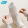 Meias femininas primavera e verão finas de cano médio cor sólida malha respirável anti-odor borda franzida estilo universitário meias largas atacado