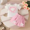 Comercio exterior verano dulce niña bebé 3D gran corazón chaqueta de manga corta aplique hebilla decorativa shorts traje de dos piezas