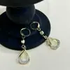Pendientes colgantes de cristal geométrico con incrustaciones de diamantes de alta clase, pendientes de temperamento de lujo discreto para afinar el rostro, pendientes pendientes