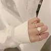 Anillo Abierto Cruzado de Doble Capa con Goteo de Aceite Negro Estilo Fresco Más Vendido Transfronterizo Set de Tres Piezas de Joyería de Mano Personalizada para Mujer