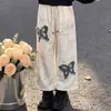 Conjunto versátil de estilo coreano para niñas: Conjunto preppy de dos piezas con diseño de dos piezas falso, una sudadera con capucha y pantalones casuales retro americanos