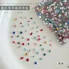 Mini pedrería para uñas de fondo plano y forma única, incluyendo diseños de corazón, ojo de caballo y mariposa, para decoración y embellecimiento de uñas; un producto popular transfronterizo