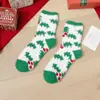 Calcetines de Navidad de coral de otoño e invierno, calcetines de suelo cálidos para el hogar de terciopelo medio, calcetines de Navidad de Papá Noel