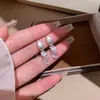 Agulha de Prata S925 Luxo Leve Nicho Sensação de Alto Padrão Estilo Frio Sensual Brincos de Argola Elegantes Moda Versátil Elegante Brincos de Tarraxa Flor