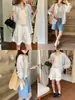 3ª Manhã Baiyu Fengxin Mistura de Tencel Casual Relaxado Camisa Listrada com Proteção Solar Zy4268