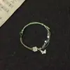 Pulsera de Mariposa Pequeña Color Púrpura Iris, Dulce y Exquisita, Diseño de Nicho de Alto Valor, Flor Tejida a Mano Regalo
