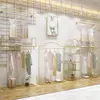 Estante de Exhibición para Tienda de Ropa Lámpara de Pared de Exhibición de Lujo Estante de Exhibición Tienda de Ropa para Mujer Dorado Colgante Lateral Colgante de Pared Combinación Estante para Ropa