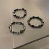 Pulsera Cruzada de Piedra Biliar Negra Estilo Frío Oscuro para Hombres Pulsera de Alto Nivel Pulsera de Diseño de Nicho Hip-Hop de Moda para Mujeres