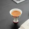 Estilo Dinastía Tang y Song Cerámica Blanca Pintada a Mano Peonía Taza Maestra de Pie Alto Juego de Té Kung Fu Taza de Té Cerámica para el Hogar
