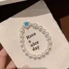 Pulsera de perlas con lazo de doble capa estilo vintage francés, diseño único y versátil, joyería de lujo ligero y de alta gama