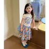Conjunto Súper Estiloso de Niña Estilo Coreano Verano 2026 Nuevo Modelo, Moda de Top con Estampado de Manga Corta y Falda Floral de Moda para Niñas Pequeñas