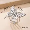 Nuevo anillo de acero inoxidable transfronterizo, moderno y único anillo de mariposa prensado en aceite para mujer, anillo de diseño geométrico que no se decolora