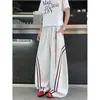 Pantalones casuales a rayas rojas retro americanos para hombre, pantalones deportivos de moda de alta calle para primavera, pantalones rectos de pierna ancha