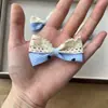 Acessórios de Amor Listrado Coreano Vazado com Laço Grampo de Cabelo Capa de Celular Malas Sapatos e Meias Acessórios de Vestuário Acessórios DIY