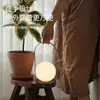 Lámpara de mesa LED portátil simple, luz nocturna, lámpara de pared recargable creativa con forma de luna, luz ambiental portátil esférica multifuncional