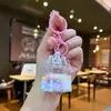 Chaveiro Estrela Rosa e Coelho da Lua Preenchido com Óleo, Chaveiro de Garrafa com Areia Líquida Estilosa Lua Pingente, Decoração para Mochila de Casal Venda por Atacado